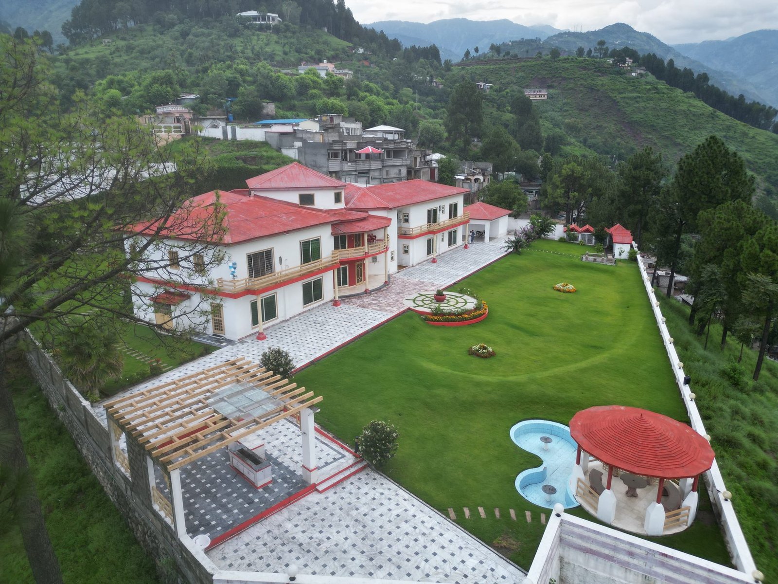 Aerial view of the estate grounds, pool and gazebo